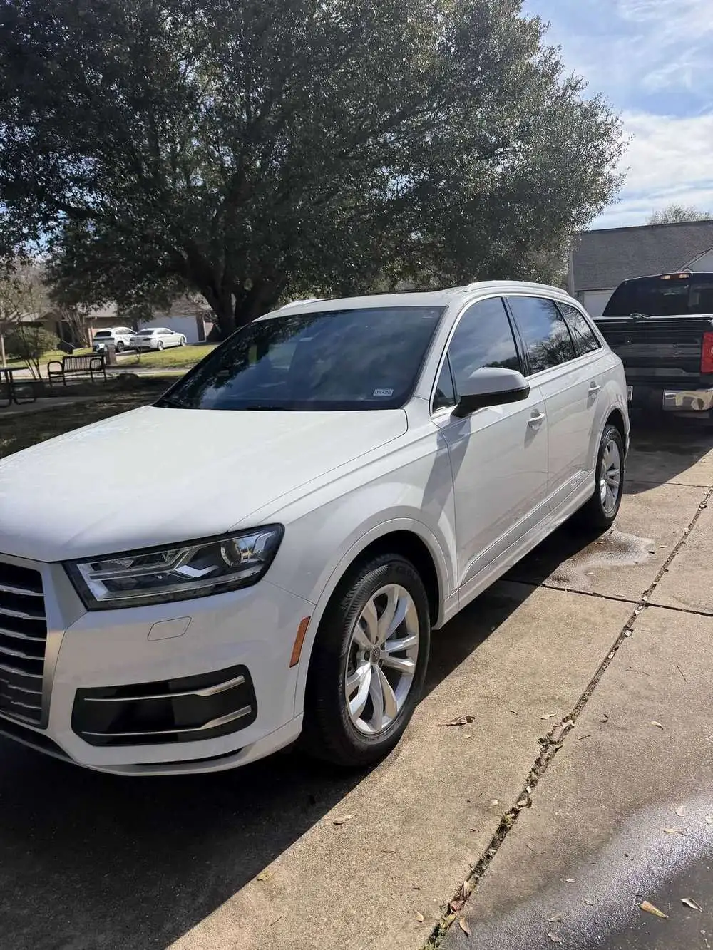 Exterior detail on white Audi Q7 in Navasota TX by Kurtz Auto Detailing