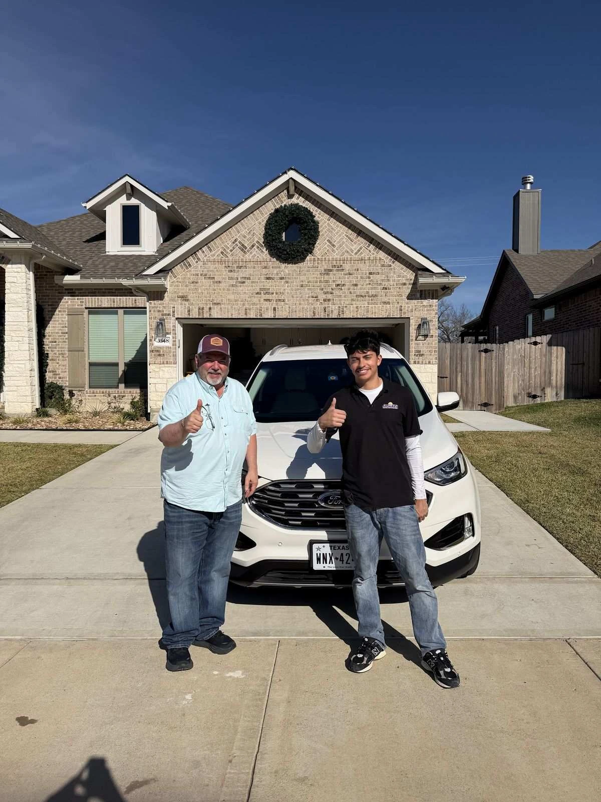 Happy customer after mobile detail in College Station TX by Kurtz Auto Detailing