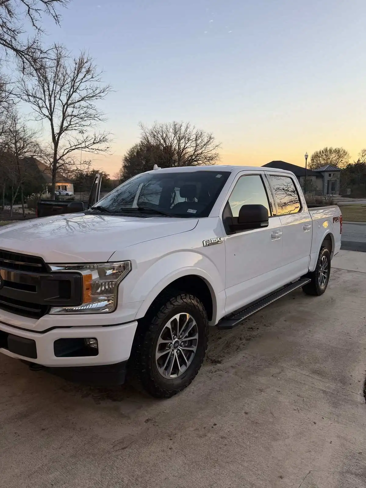 White Ford F-150 exterior detail at sunset by Kurtz Mobile Detailing in BCS Texas